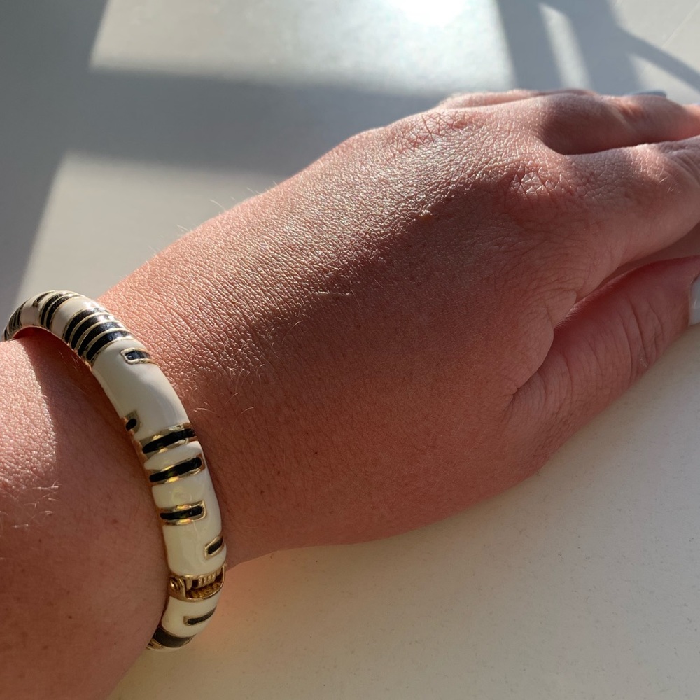 Black, white, and gold bangle